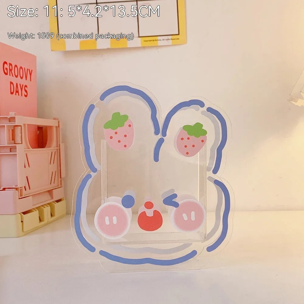 Square transparent acrylic storage box with decorative character design for desk organisation