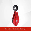 Red industrial steel lifting pulley with a forged ring hook and safety latch for wire rope.
