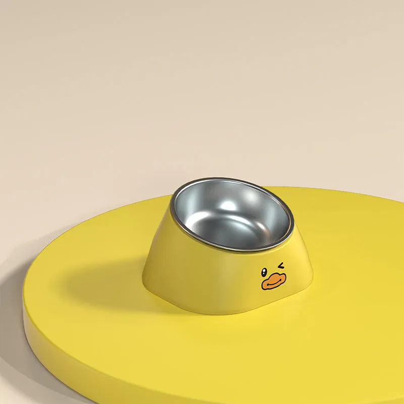 Green tilted stainless steel pet bowl showing 15-degree feeding angle