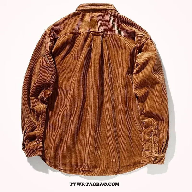 A caramel-coloured loose-fit corduroy long sleeve shirt laid flat, showing its cardigan-style cut and textured fabric.
