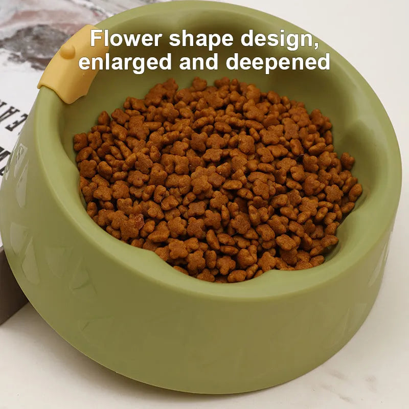 Green plastic double pet bowl for cats and dogs with anti-tipping base and separate food and water compartments