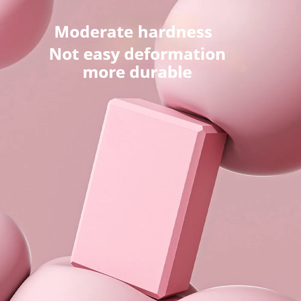 Solid-colour EVA foam yoga block with hexagonal ridges for grip