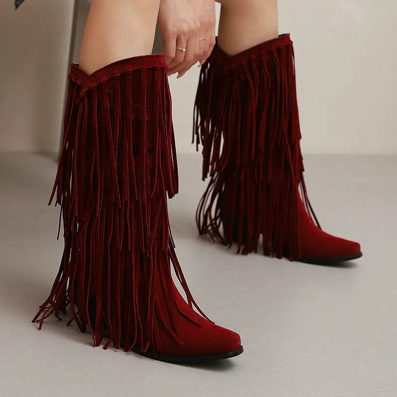 Women's suede high boots with tassel detail, chunky heel, and waterproof platform sole in beige colour.