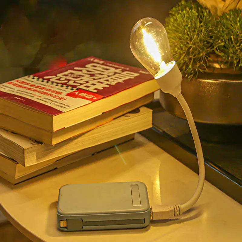 USB rechargeable folding night light with tungsten filament LED bulb in folded and unfolded positions