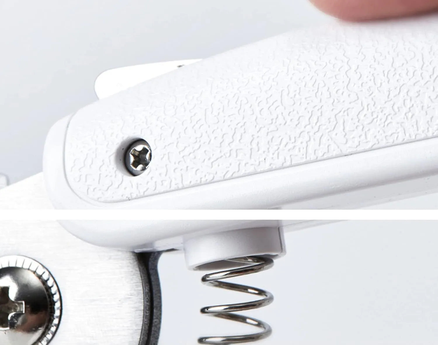 White pet nail clippers with LED light, transparent anti-splash guard open, and separate nail file.
