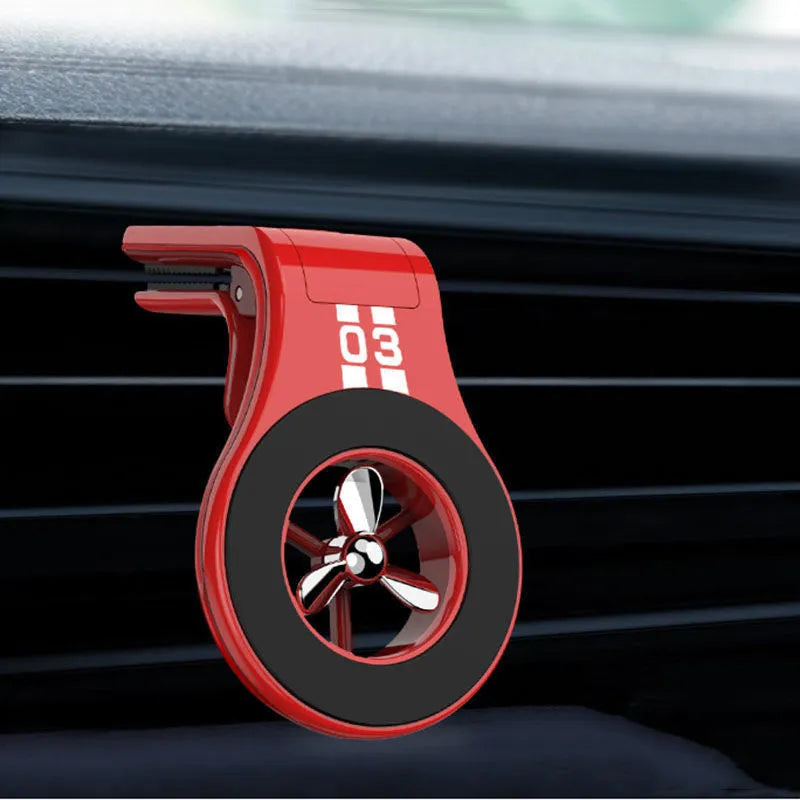 Magnetic car phone holder attached to vehicle air vent with phone mounted