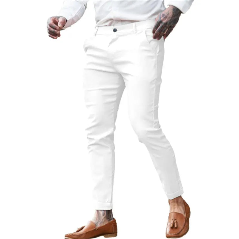 Men's slim fit cotton twill pencil trousers in various solid colours showing stretch fabric and zip fly detail