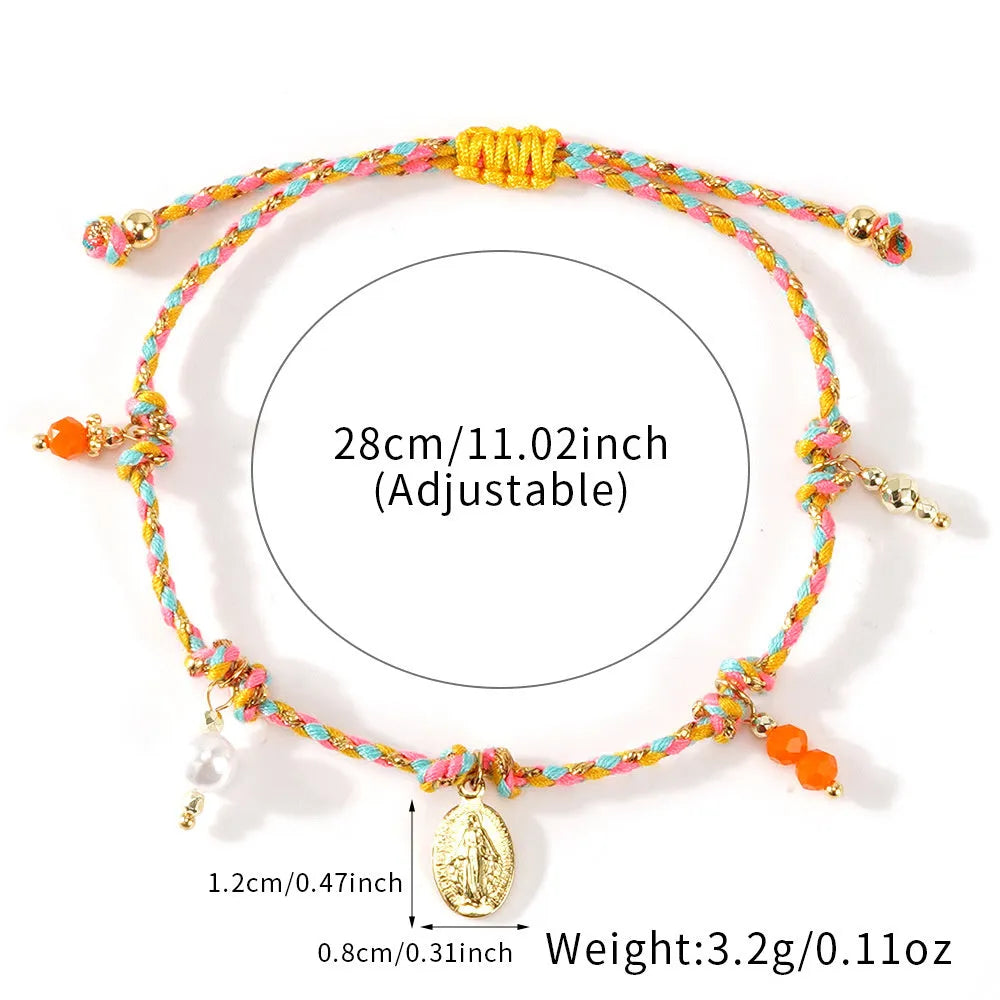 Close-up of a hand-woven colourful braided rope bracelet for women with an integrated fabric strap tag.