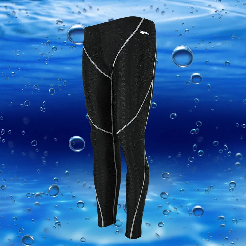 Men's nylon cropped swimming trunks in black with coloured lines suitable for swimming and cycling
