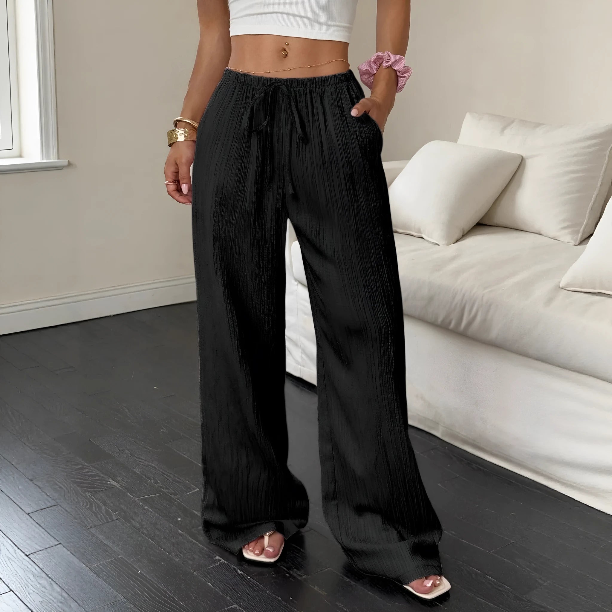 Women's wide-leg casual trousers with lace-up waist detailing in black or pink colour options