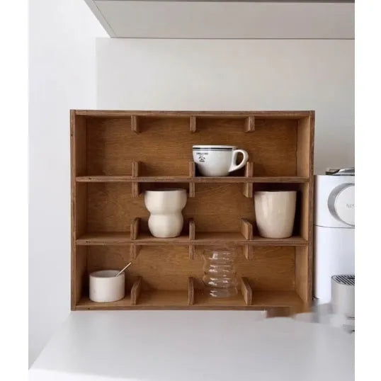 Square wooden storage rack with multiple grid compartments for cups in a birch wood finish.