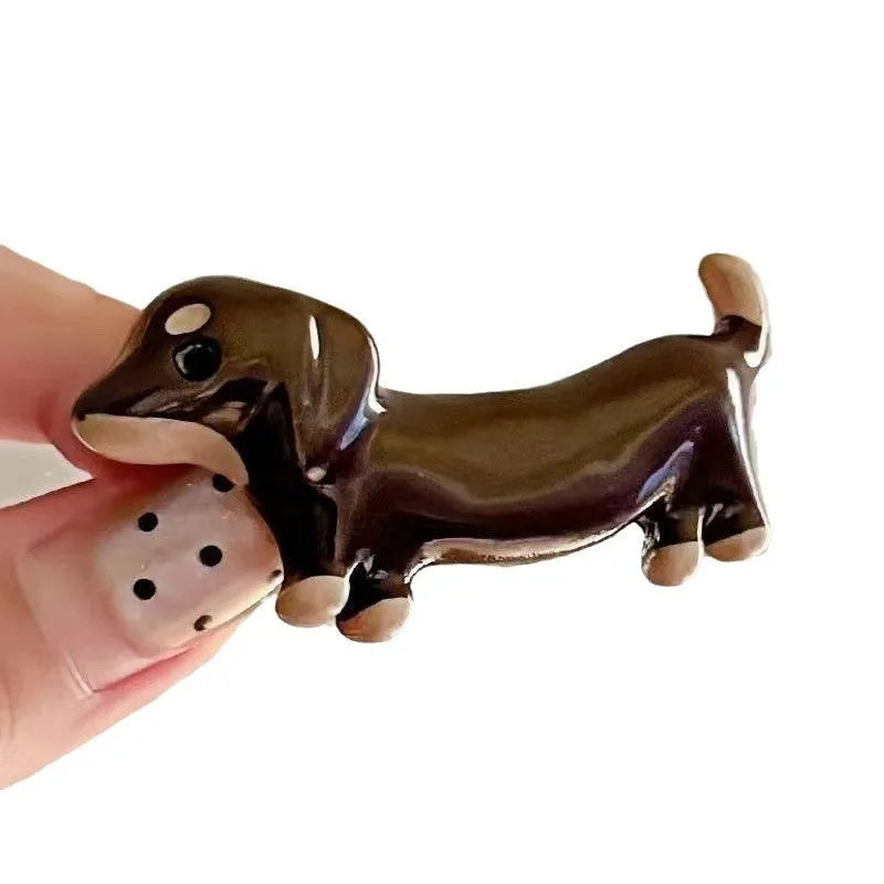 Dachshund dog design hair barrettes with electroplated finish, showing front and back views