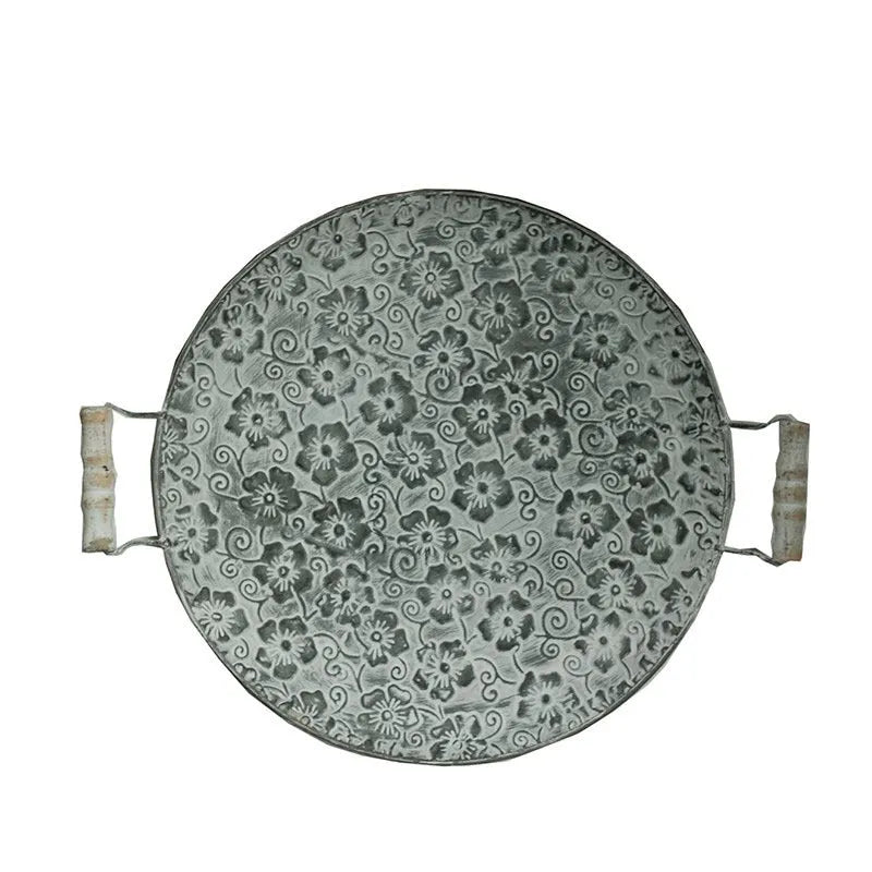 Round wrought iron storage tray in European style, shown in two available sizes for home organisation.