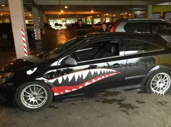 Shark design PVC car body sticker shown on a vehicle door, available in two large size options.