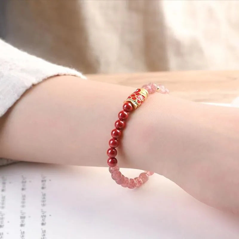 Women's purple cinnabar bracelet with strawberry quartz stones and Koi pattern design
