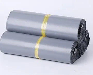 A pack of 100 clear PE courier bags for clothing with adhesive seals, shown in different sizes and colours.