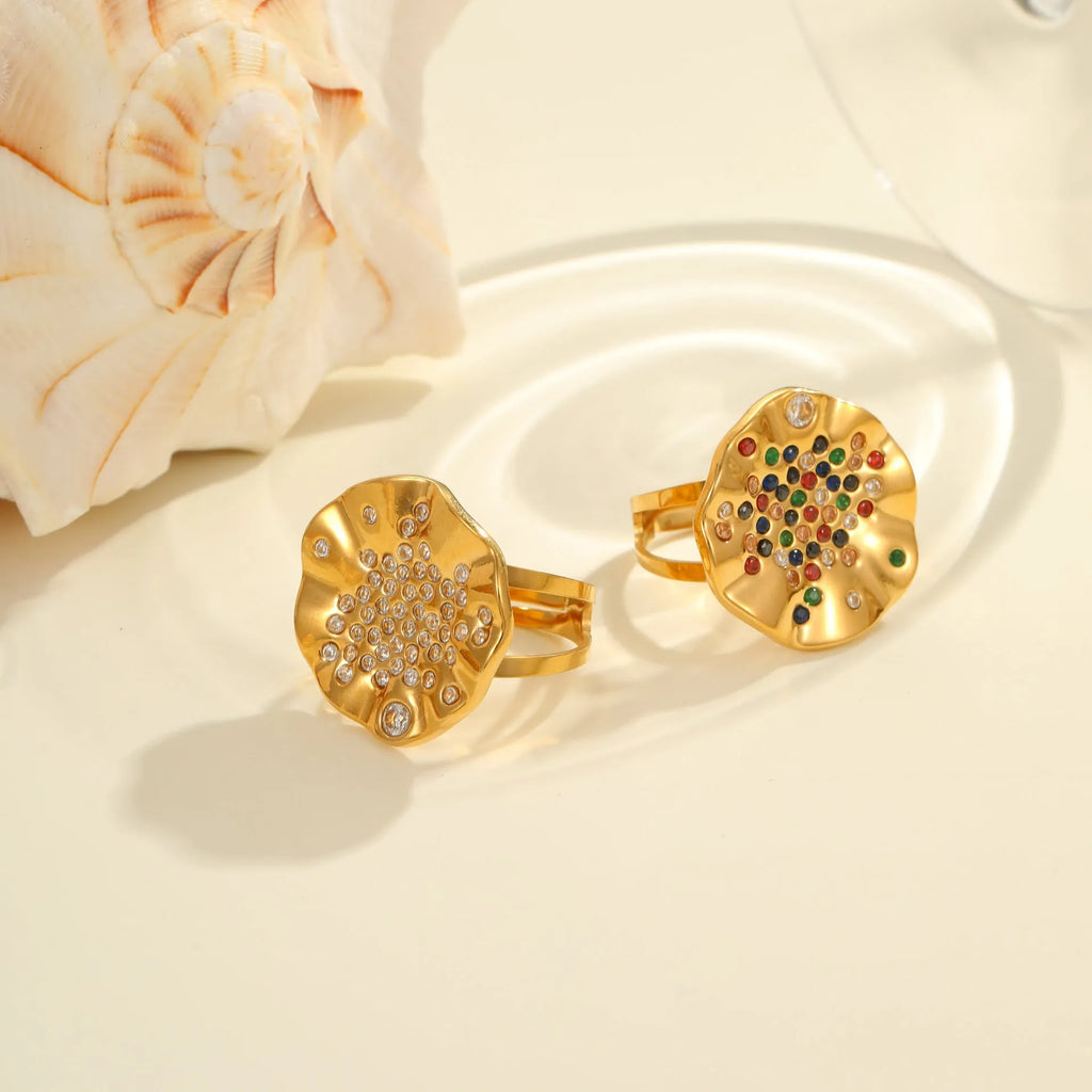 Geometric adjustable ring with pleated design and colourful diamond inlays on stainless steel band