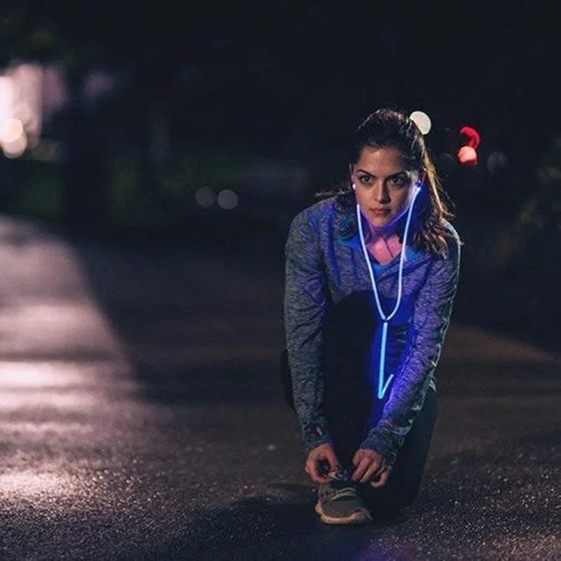 Blue Magic Light LED earphones with illuminated aluminium alloy shells showing EL light lines