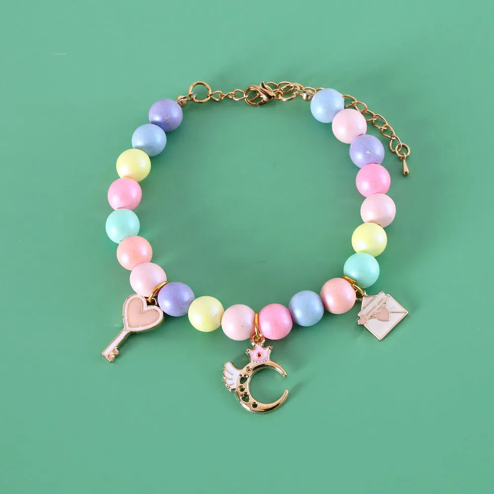 Adjustable pet collar with colourful macaron resin charms in moon, meteor, rabbit designs