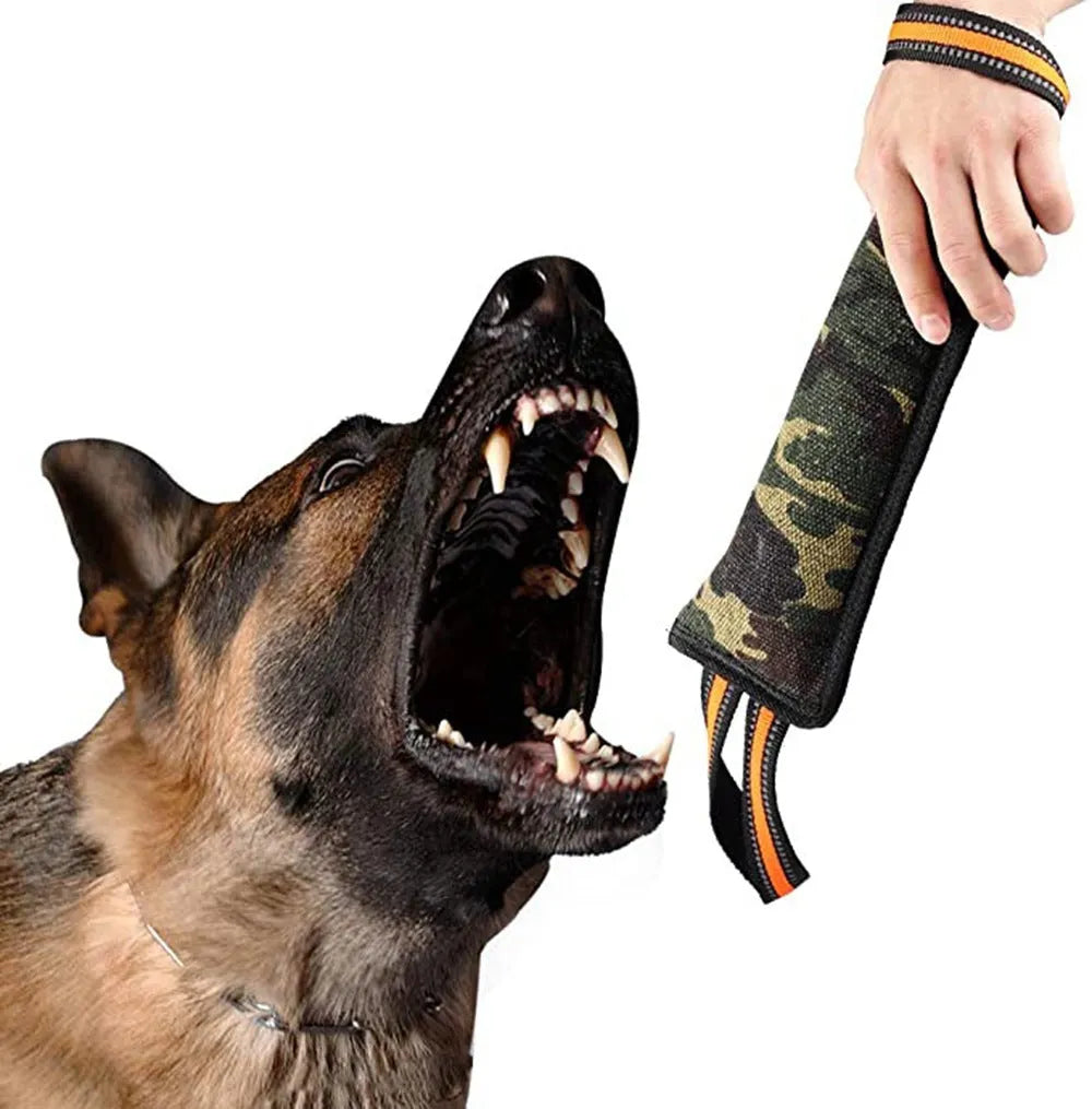 Reflective dog training jute bite stick with yellow edge, 55 cm length, on outdoor grass