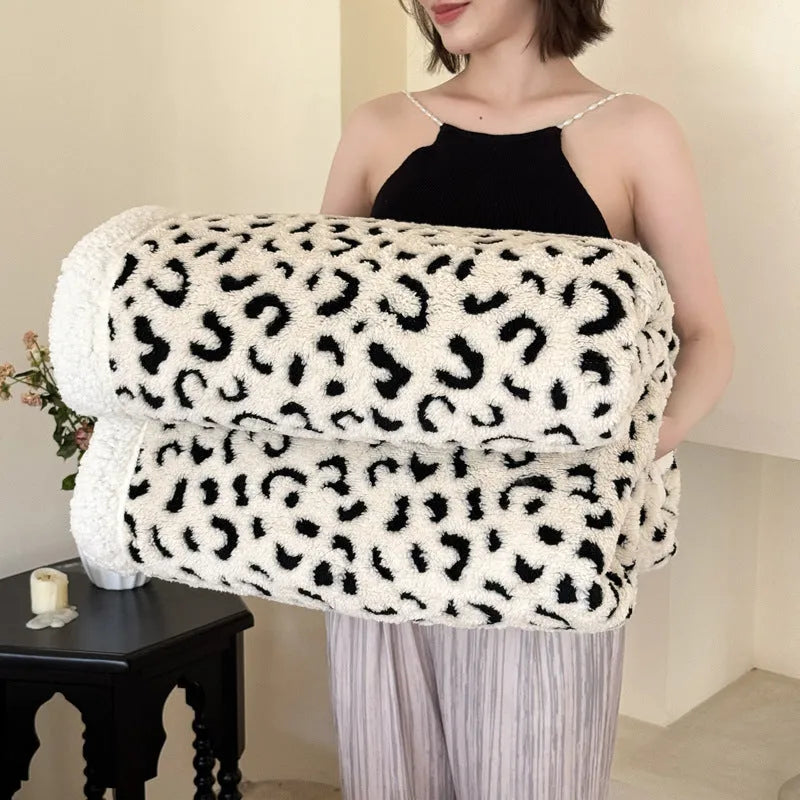 Double-layer cationic leopard jacquard taffeta blanket in animal print pattern showing texture and size options