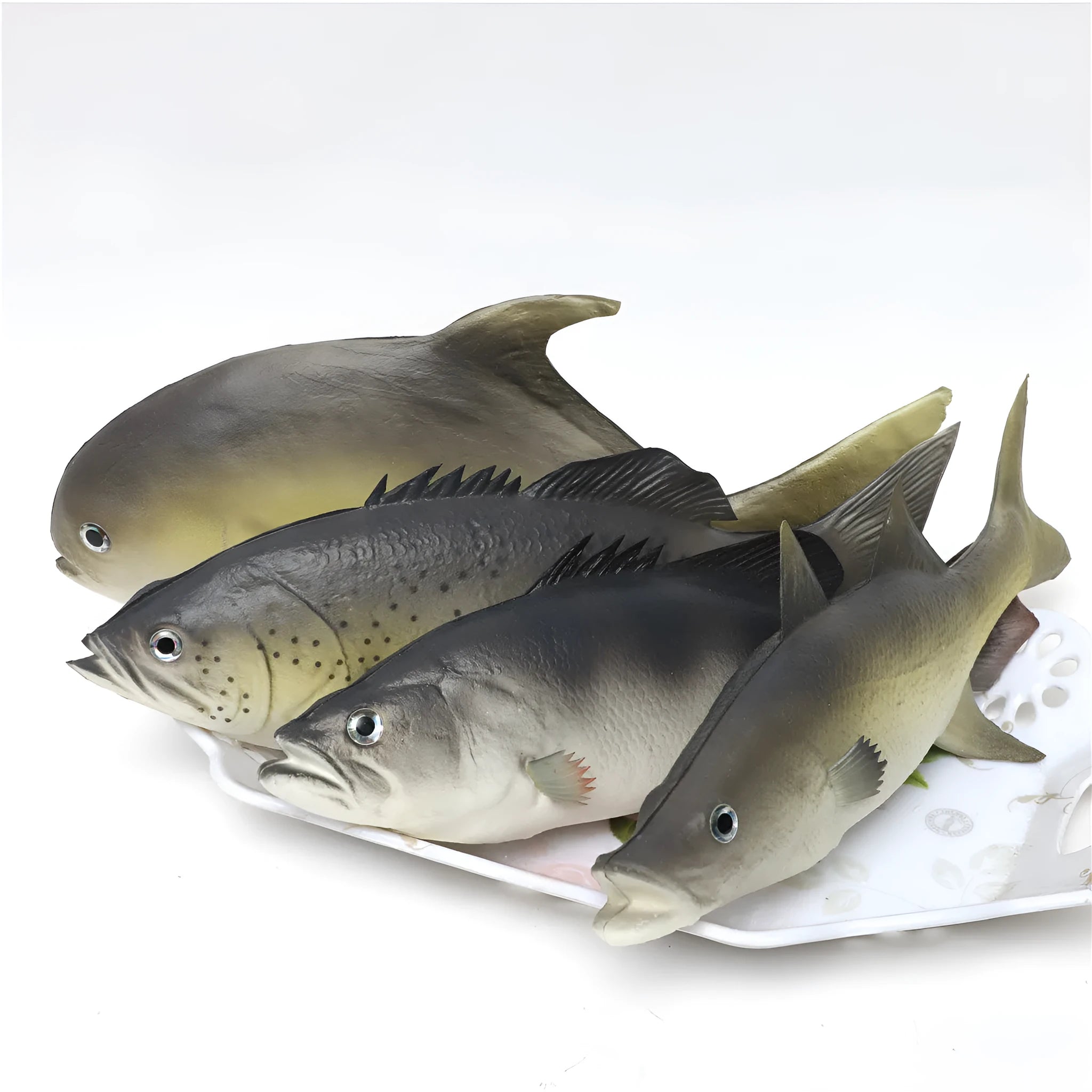 Three PU simulated tuna fish ornaments including yellow-fin tuna and small tuna varieties