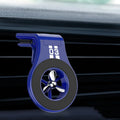 Magnetic car phone holder attached to vehicle air vent with phone mounted