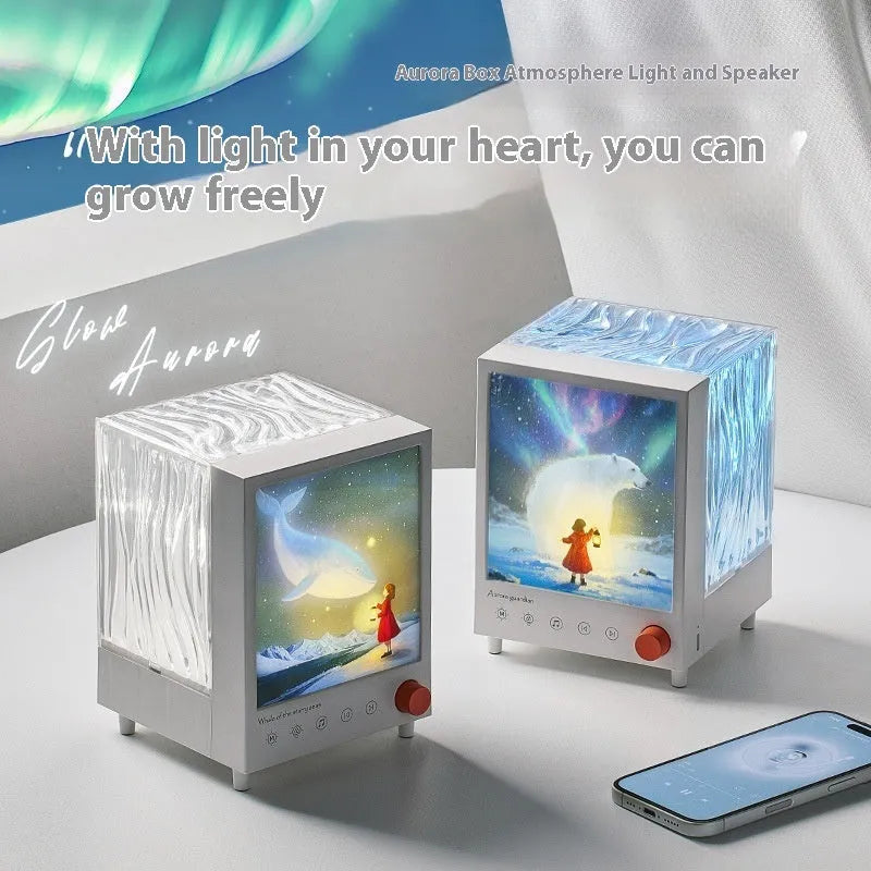 Aurora Treasure Box projection lamp projecting star sea whale light pattern, with Bluetooth speaker.