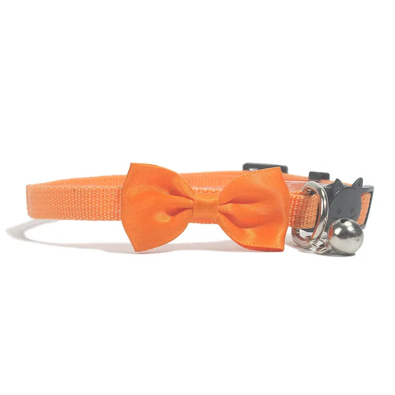 Adjustable nylon cat collar with bell in striped pattern showing multiple colour options