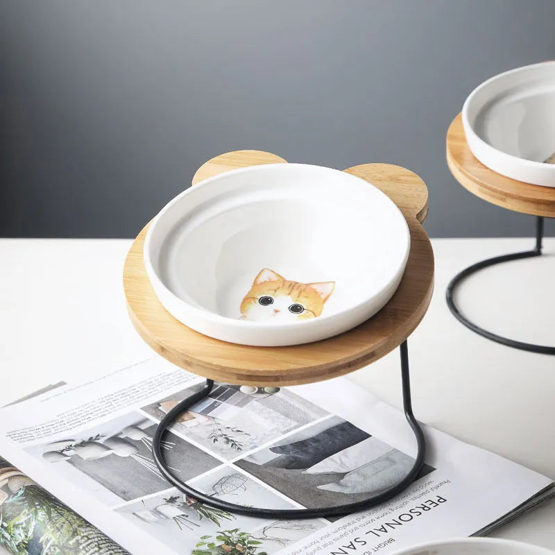 Ceramic cat bowl holder with raised rack in grey cat colour