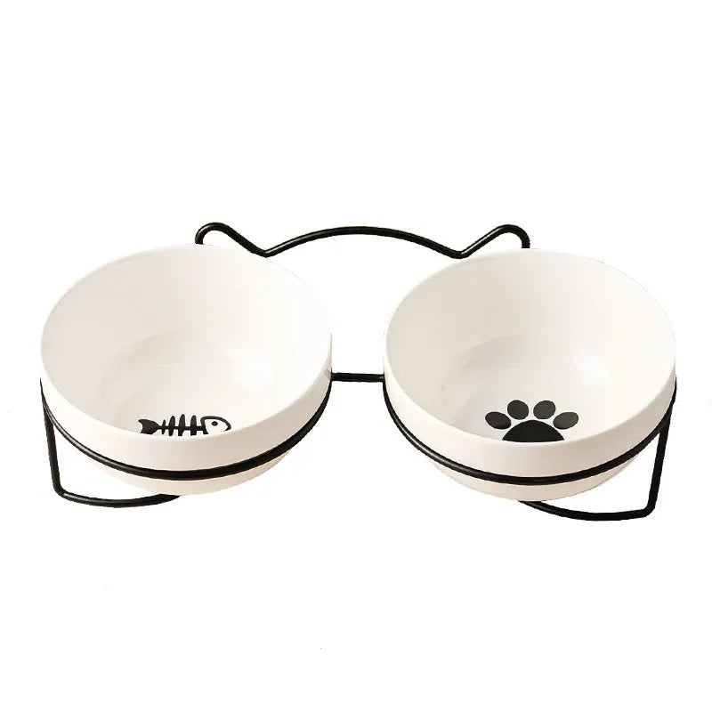 White ceramic cat bowl with iron frame in cat footprints design