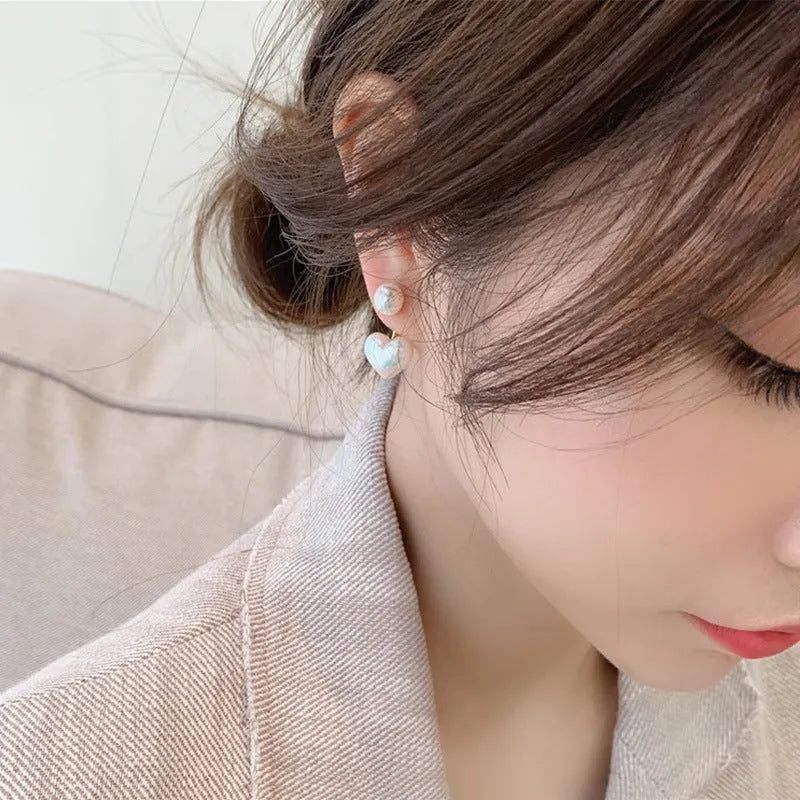 Korean style heart-shaped women's stud earrings with artificial pearl inlay on alloy posts