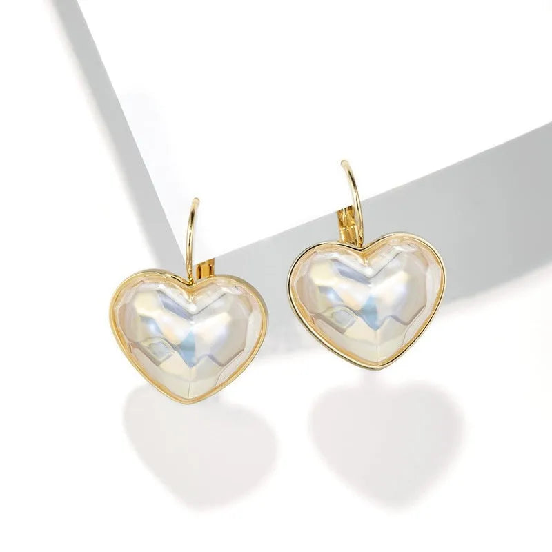 Gold-coloured alloy clip-on earrings with natural style design and metal decorative elements for women