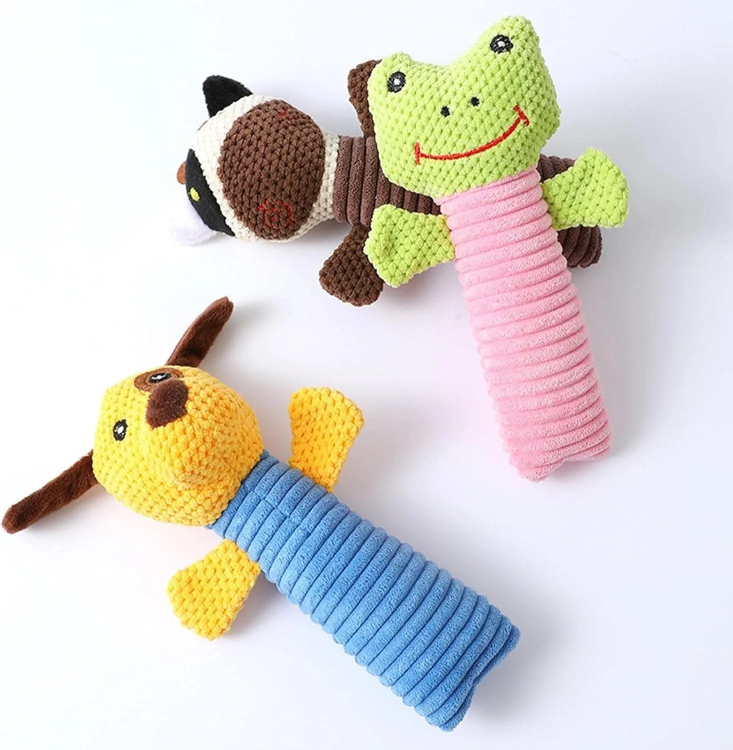 Soft plush dog squeaky toy in stuffed animal shape for dental cleaning chew.