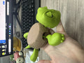 Creative turtle-shaped ABS plastic coaster in light green for drinkware heat insulation.