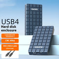 Compact aluminum USB4 external hard drive enclosure for M.2 NVMe SSDs on a desk.
