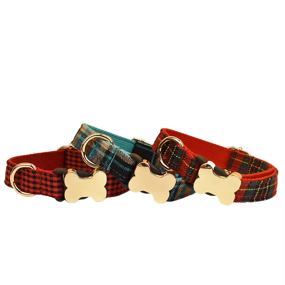 Flat nylon dog collar with a printed grid pattern and a silver bone-shaped metal buckle.