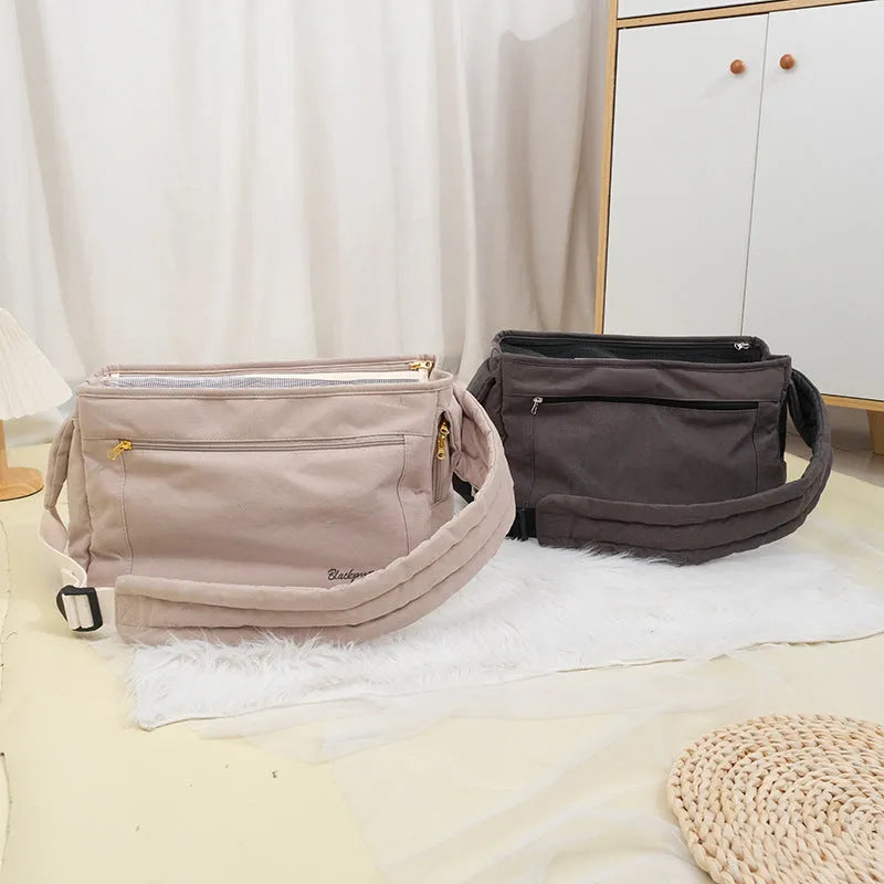 Large capacity soft surface messenger pet carrier bag in beige with small dog inside