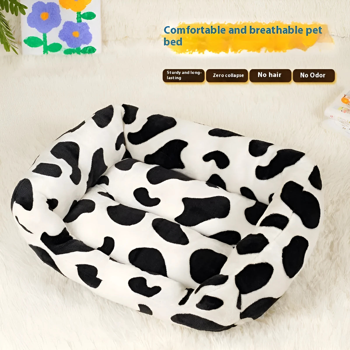 Four Seasons Universal Kennel dog bed in cow colour cloth, size M 40x50cm, with a dog resting on it.