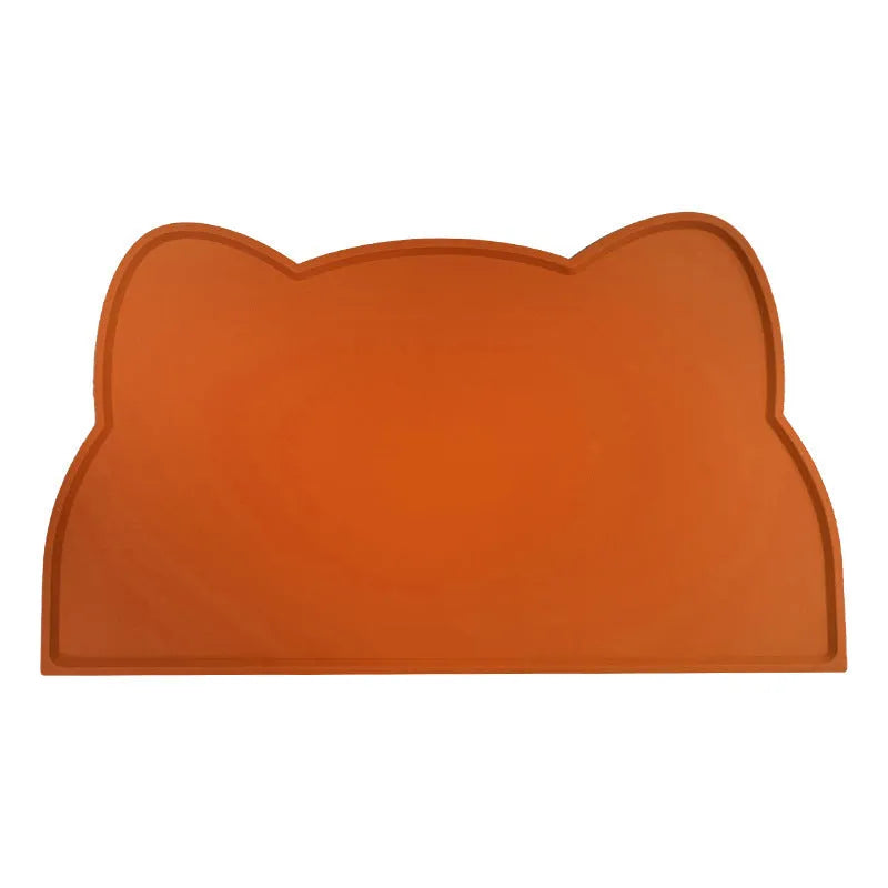 Cat head shaped silicone pet feeding mat in solid colour measuring 44 by 24 centimetres