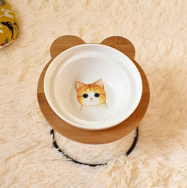 Ceramic cat bowl holder with raised rack in grey cat colour