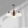 Creative persimmon glass and chrome chandelier with multiple light heads in Middle Ancient style.