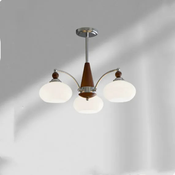 Creative persimmon glass and chrome chandelier with multiple light heads in Middle Ancient style.