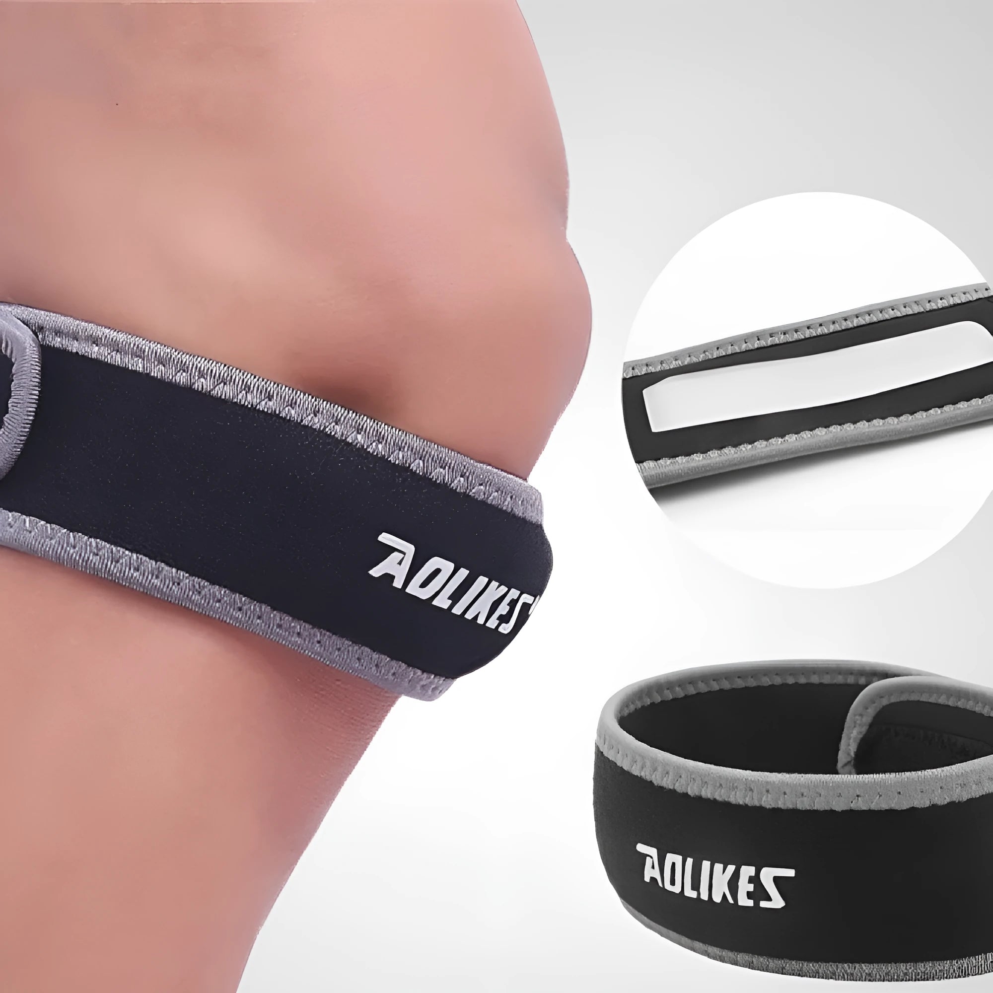Black and grey adult patella retinaculum knee support for running and sports.