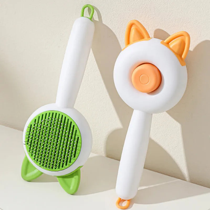 Self-cleaning cat grooming brush with stainless steel teeth and TPR massage nodes in two-tone colours