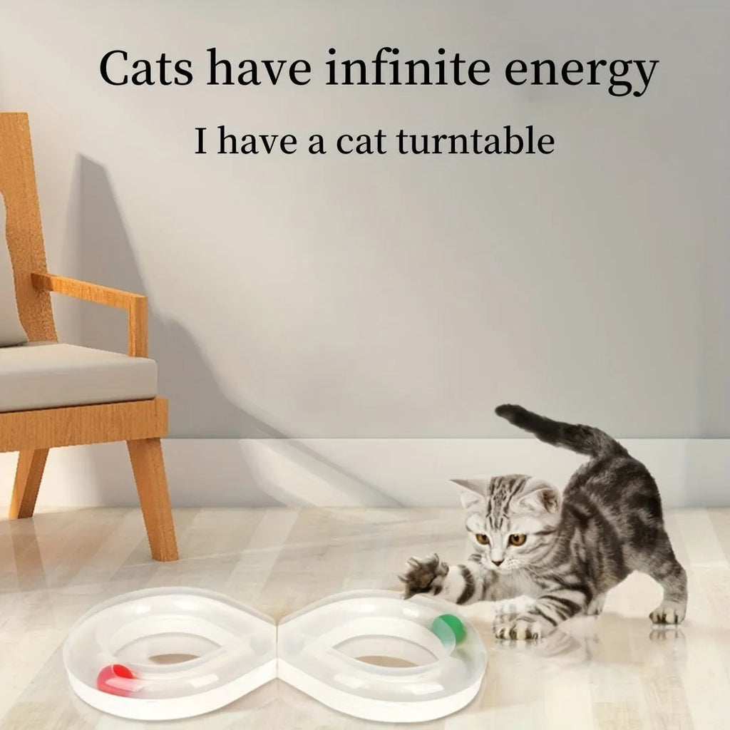 Blue and white interactive cat toy set with turntable track, ball, and teasing stick on floor