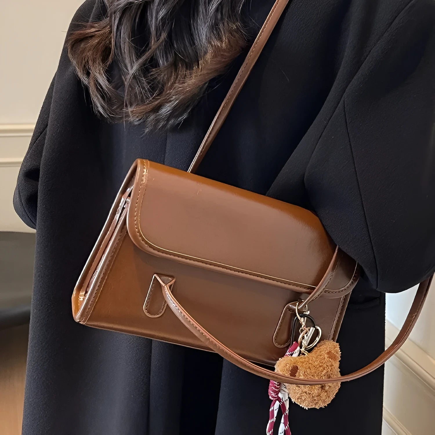 Brown women's PU Maillard handbag with pendant detail, horizontal square shape, and double shoulder straps
