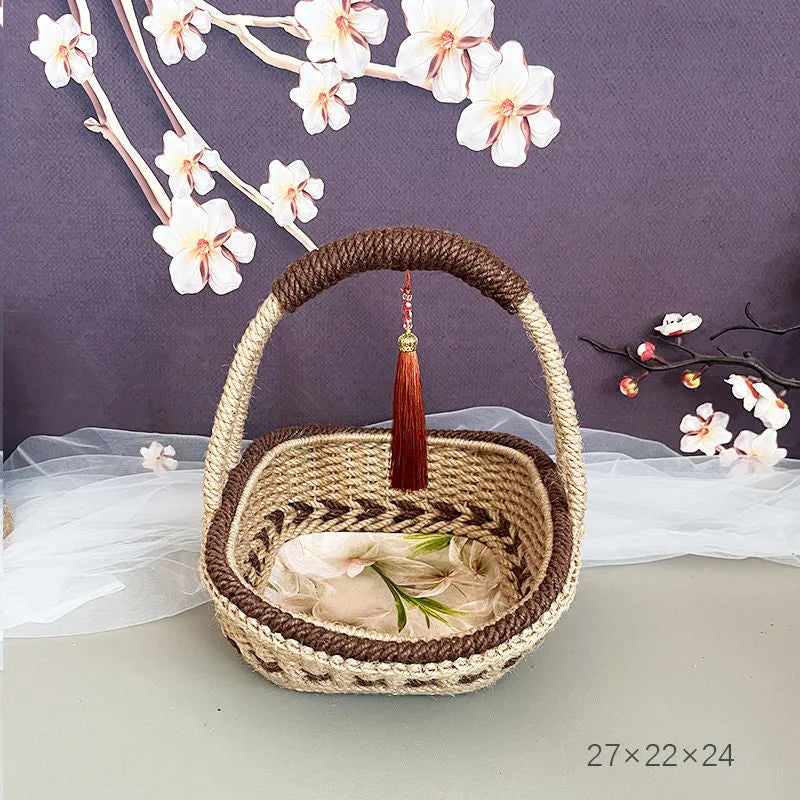 Hand-woven rustic straw storage basket in coffee brown colour.