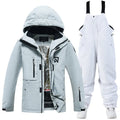 Unisex winter ski suit with veneer double board construction in blue, green, pink, or white colour combinations