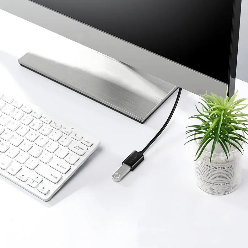 Black USB male to female extension cable showing connectors, available in multiple lengths from 1 to 5 metres.